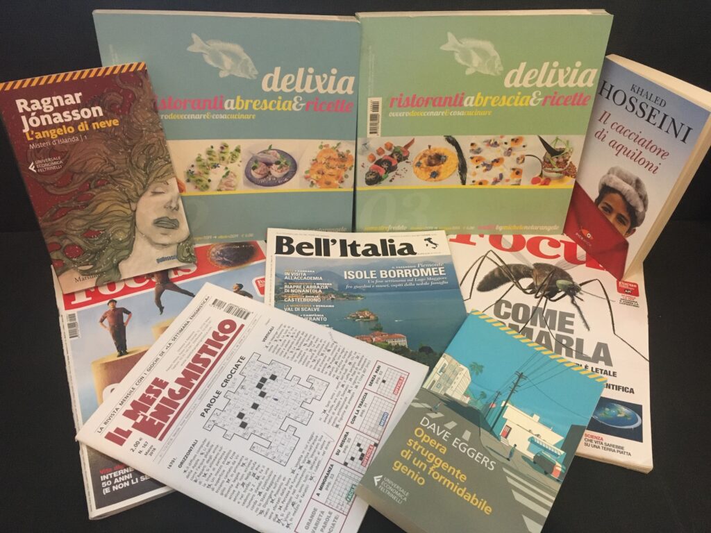 Knížky a časopisy v italštině, které máme doma.
